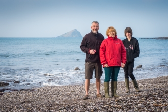 Paul and his family on the beach